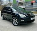 Черный Лексус РХ, объемом двигателя 3.5 л и пробегом 260 тыс. км за 12500 $, фото 1 на Automoto.ua
