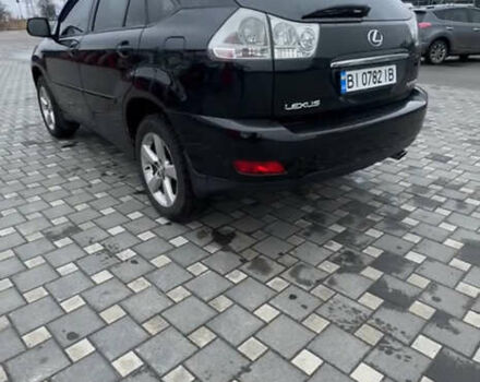 Черный Лексус РХ, объемом двигателя 3.46 л и пробегом 248 тыс. км за 11500 $, фото 3 на Automoto.ua