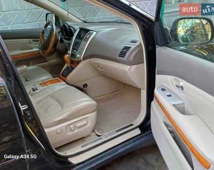 Черный Лексус РХ, объемом двигателя 3.46 л и пробегом 280 тыс. км за 11500 $, фото 16 на Automoto.ua