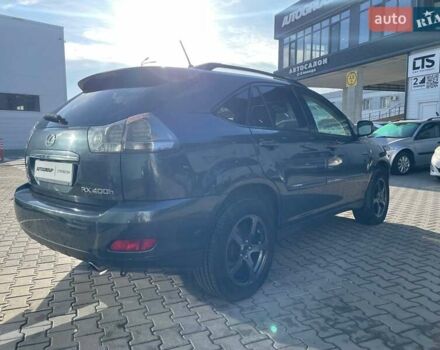 Черный Лексус РХ, объемом двигателя 3.31 л и пробегом 297 тыс. км за 9499 $, фото 2 на Automoto.ua