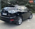 Черный Лексус РХ, объемом двигателя 3.46 л и пробегом 255 тыс. км за 12700 $, фото 1 на Automoto.ua