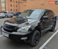 Черный Лексус РХ, объемом двигателя 3.46 л и пробегом 325 тыс. км за 10800 $, фото 1 на Automoto.ua