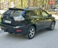 Черный Лексус РХ, объемом двигателя 3.5 л и пробегом 330 тыс. км за 11200 $, фото 1 на Automoto.ua