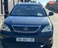 Черный Лексус РХ, объемом двигателя 3.46 л и пробегом 320 тыс. км за 9700 $, фото 1 на Automoto.ua