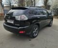 Черный Лексус РХ, объемом двигателя 3.5 л и пробегом 285 тыс. км за 10800 $, фото 1 на Automoto.ua