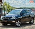 Черный Лексус РХ, объемом двигателя 3.46 л и пробегом 291 тыс. км за 10900 $, фото 1 на Automoto.ua
