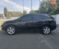 Черный Лексус РХ, объемом двигателя 3.46 л и пробегом 285 тыс. км за 11300 $, фото 1 на Automoto.ua
