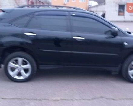 Черный Лексус РХ, объемом двигателя 3.46 л и пробегом 270 тыс. км за 12500 $, фото 1 на Automoto.ua