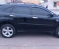 Черный Лексус РХ, объемом двигателя 3.46 л и пробегом 270 тыс. км за 12500 $, фото 1 на Automoto.ua