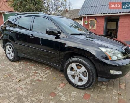 Черный Лексус РХ, объемом двигателя 3.46 л и пробегом 367 тыс. км за 10900 $, фото 3 на Automoto.ua