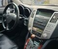 Черный Лексус РХ, объемом двигателя 3.5 л и пробегом 285 тыс. км за 10800 $, фото 4 на Automoto.ua