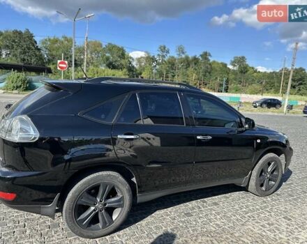 Черный Лексус РХ, объемом двигателя 3.46 л и пробегом 242 тыс. км за 12000 $, фото 1 на Automoto.ua