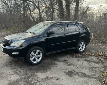 Черный Лексус РХ, объемом двигателя 3.46 л и пробегом 224 тыс. км за 12500 $, фото 1 на Automoto.ua