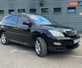 Черный Лексус РХ, объемом двигателя 3.46 л и пробегом 255 тыс. км за 12700 $, фото 2 на Automoto.ua