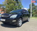 Черный Лексус РХ, объемом двигателя 3.46 л и пробегом 185 тыс. км за 11900 $, фото 2 на Automoto.ua