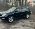 Черный Лексус РХ, объемом двигателя 3.46 л и пробегом 240 тыс. км за 11700 $, фото 1 на Automoto.ua