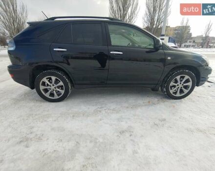 Черный Лексус РХ, объемом двигателя 3.46 л и пробегом 273 тыс. км за 11700 $, фото 3 на Automoto.ua
