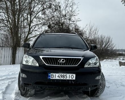 Черный Лексус РХ, объемом двигателя 3.5 л и пробегом 250 тыс. км за 9799 $, фото 1 на Automoto.ua