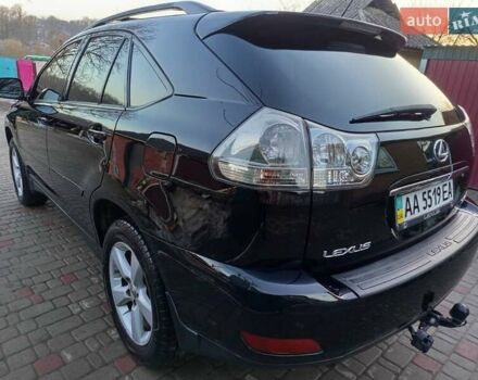 Черный Лексус РХ, объемом двигателя 3.46 л и пробегом 372 тыс. км за 10800 $, фото 1 на Automoto.ua