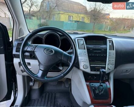 Черный Лексус РХ, объемом двигателя 3.46 л и пробегом 190 тыс. км за 12500 $, фото 60 на Automoto.ua