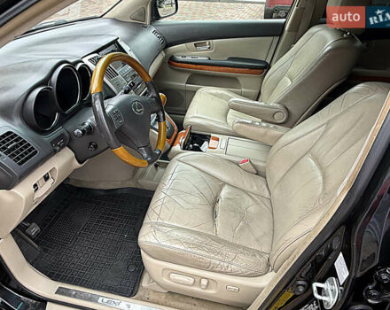 Черный Лексус РХ, объемом двигателя 3.3 л и пробегом 225 тыс. км за 11100 $, фото 11 на Automoto.ua