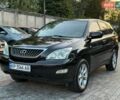 Черный Лексус РХ, объемом двигателя 3.5 л и пробегом 250 тыс. км за 8600 $, фото 1 на Automoto.ua