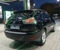 Черный Лексус РХ, объемом двигателя 3.46 л и пробегом 170 тыс. км за 12300 $, фото 1 на Automoto.ua