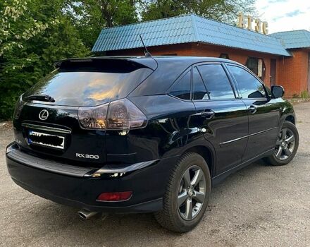 Черный Лексус РХ, объемом двигателя 3 л и пробегом 229 тыс. км за 12900 $, фото 2 на Automoto.ua