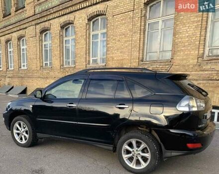 Черный Лексус РХ, объемом двигателя 3.46 л и пробегом 340 тыс. км за 11000 $, фото 4 на Automoto.ua