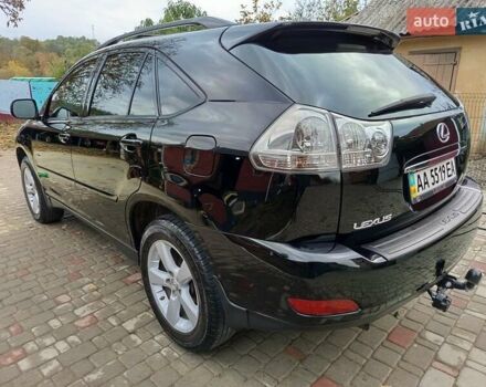 Черный Лексус РХ, объемом двигателя 3.46 л и пробегом 367 тыс. км за 10900 $, фото 1 на Automoto.ua