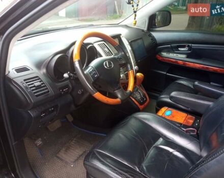 Черный Лексус РХ, объемом двигателя 3.5 л и пробегом 300 тыс. км за 9999 $, фото 2 на Automoto.ua