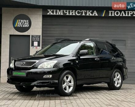 Черный Лексус РХ, объемом двигателя 3.46 л и пробегом 220 тыс. км за 9900 $, фото 1 на Automoto.ua
