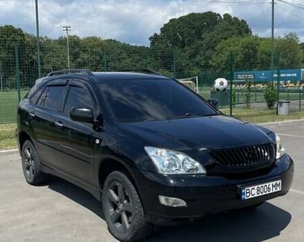 Черный Лексус РХ, объемом двигателя 3.46 л и пробегом 205 тыс. км за 16000 $, фото 2 на Automoto.ua