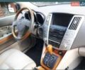 Черный Лексус РХ, объемом двигателя 3.5 л и пробегом 300 тыс. км за 16300 $, фото 2 на Automoto.ua