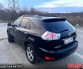 Черный Лексус РХ, объемом двигателя 3.5 л и пробегом 185 тыс. км за 14000 $, фото 1 на Automoto.ua