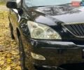 Черный Лексус РХ, объемом двигателя 3.5 л и пробегом 295 тыс. км за 10790 $, фото 1 на Automoto.ua