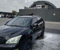 Черный Лексус РХ, объемом двигателя 4 л и пробегом 170 тыс. км за 14500 $, фото 1 на Automoto.ua