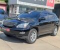 Черный Лексус РХ, объемом двигателя 3.5 л и пробегом 187 тыс. км за 11390 $, фото 1 на Automoto.ua
