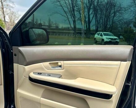 Черный Лексус РХ, объемом двигателя 3.5 л и пробегом 180 тыс. км за 12800 $, фото 1 на Automoto.ua