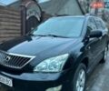 Черный Лексус РХ, объемом двигателя 3.46 л и пробегом 296 тыс. км за 9500 $, фото 2 на Automoto.ua