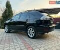 Чорний Лексус РХ, об'ємом двигуна 3.46 л та пробігом 185 тис. км за 12000 $, фото 1 на Automoto.ua