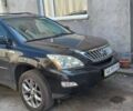 Черный Лексус РХ, объемом двигателя 3.5 л и пробегом 168 тыс. км за 11300 $, фото 1 на Automoto.ua