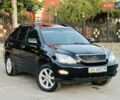 Черный Лексус РХ, объемом двигателя 3.46 л и пробегом 220 тыс. км за 10950 $, фото 1 на Automoto.ua