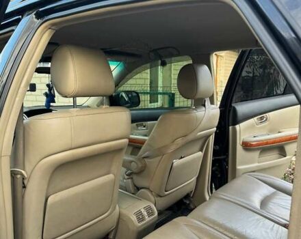 Черный Лексус РХ, объемом двигателя 3.3 л и пробегом 263 тыс. км за 13900 $, фото 3 на Automoto.ua