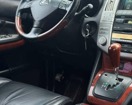 Черный Лексус РХ, объемом двигателя 3.46 л и пробегом 195 тыс. км за 11950 $, фото 99 на Automoto.ua