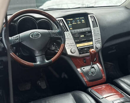 Черный Лексус РХ, объемом двигателя 3.46 л и пробегом 195 тыс. км за 11950 $, фото 132 на Automoto.ua
