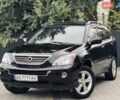 Черный Лексус РХ, объемом двигателя 3.3 л и пробегом 172 тыс. км за 12500 $, фото 1 на Automoto.ua