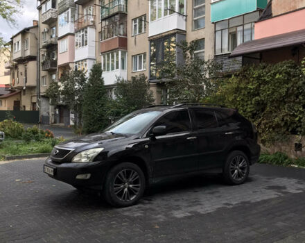 Черный Лексус РХ, объемом двигателя 3.5 л и пробегом 214 тыс. км за 12800 $, фото 2 на Automoto.ua