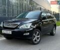 Черный Лексус РХ, объемом двигателя 3.46 л и пробегом 184 тыс. км за 11500 $, фото 1 на Automoto.ua
