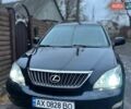 Черный Лексус РХ, объемом двигателя 3.46 л и пробегом 296 тыс. км за 9500 $, фото 1 на Automoto.ua